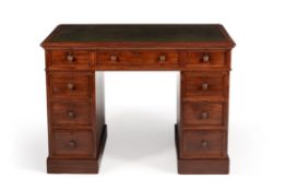 A Victorian mahogany twin pedestal desk