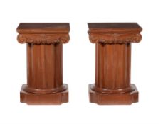 A pair of bedside cabinets