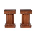 A pair of bedside cabinets