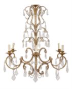 A Continental, gold painted wrought and sheet iron and glass mounted six light chandelier