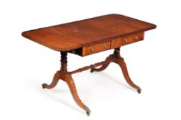 A Regency satinwood and mahogany crossbanded sofa table