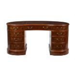 A walnut pedestal desk in Victorian style