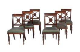 Y A set of six mahogany and ebony inlaid dining chairs