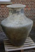 A substantial red stoneware urn