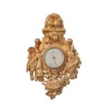 A French carved giltwood aneroid barometer in the 18th century taste