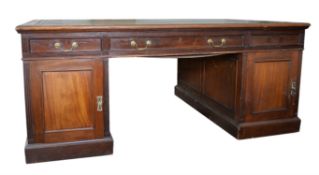 An Edwardian mahogany partners pedestal desk