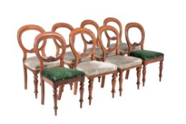 A set of six Victorian mahogany balloon back dining chairs