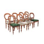 A set of six Victorian mahogany balloon back dining chairs