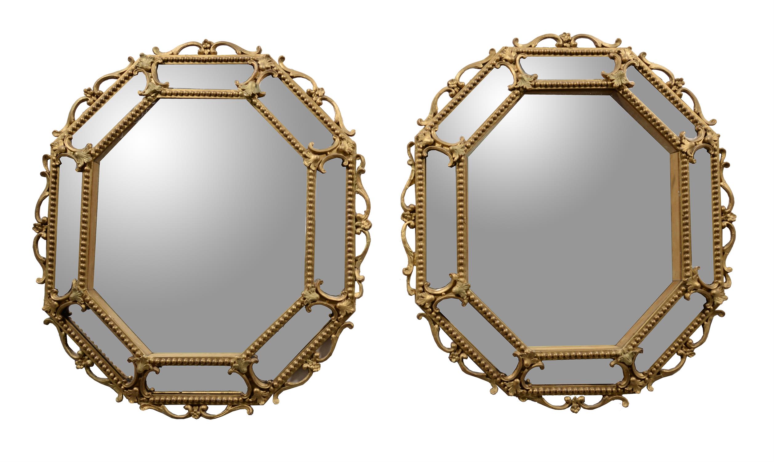 A pair of giltwood wall mirrors