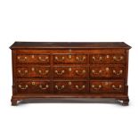 A George III oak and mahogany banded mule chest