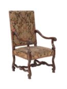 A walnut and tapestry upholstered armchair