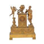 A French gilt metal mantle clock in Empire style