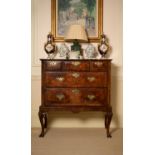 A George II walnut chest on stand