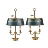 A pair of gilt metal and tole twin light table lamps in the manner of Louis Philippe bouillotte lamp