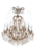 A substantial French gilt metal and cut and moulded glass twenty-five light chandelier