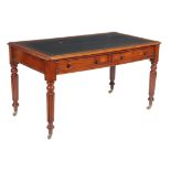 An early Victorian mahogany writing table