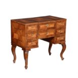 A French walnut quarter veneered and parquetry banded dressing table