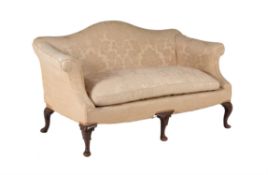 A mahogany and upholstered sofa