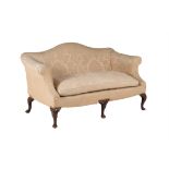 A mahogany and upholstered sofa