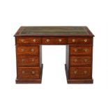 A mahogany partners' desk in George III style