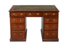 A mahogany partners' desk in George III style