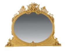 A late Victorian carved giltwood and composition overmantel mirror