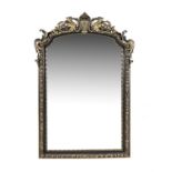 A black painted and parcel gilt wood and composition wall mirror