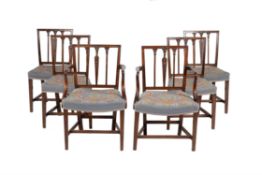 A set of twelve mahogany dining chairs in George III style