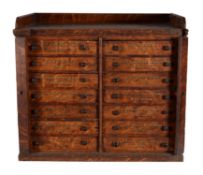 An Edwardian oak 'housekeeper's' Wellington chest