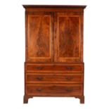 A George III mahogany and crossbanded linen press
