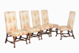 A set of five walnut and upholstered side chairs