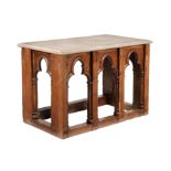 An oak and limestone mounted side table in Gothic taste