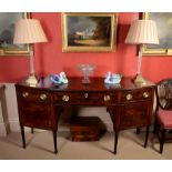 A Regency mahogany and crossbanded sideboard