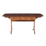 A Regency mahogany and satinwood crossbanded sofa table