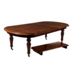 A Victorian mahogany extending dining table