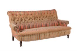 A Victorian stained beech and button upholstered sofa