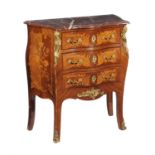 Y A kingwood and floral marquetry inlaid commode in Louis XV style