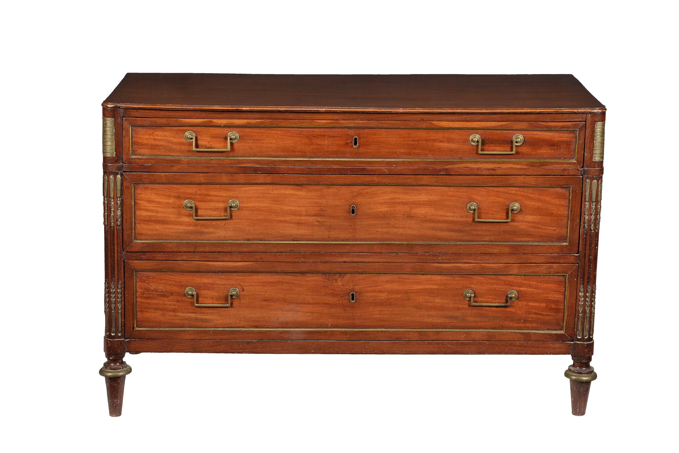 A French Directoire mahogany and brass inlaid commode