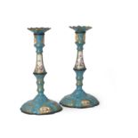 A pair of English enamelled copper candlesticks