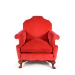 A walnut and upholstered armchair, by HOWARD & SONS