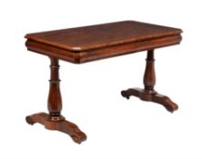 A Victorian mahogany library table