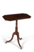 A mahogany tripod table