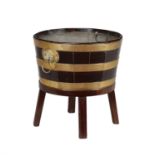A mahogany and brass bound wine cooler