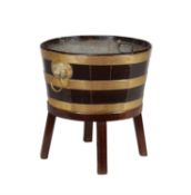 A mahogany and brass bound wine cooler