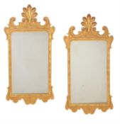 A pair of giltwood wall mirrors in mid 18th century style