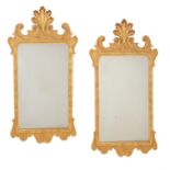 A pair of giltwood wall mirrors in mid 18th century style