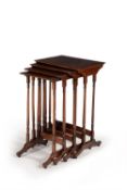 A nest of four mahogany Quartetto tables in Regency style