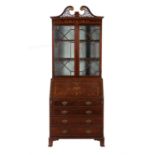 A mahogany and inlaid bureau bookcase