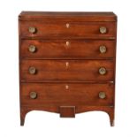 A mahogany chest of four drawers