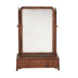 A George III walnut and parcel gilt dressing mirror